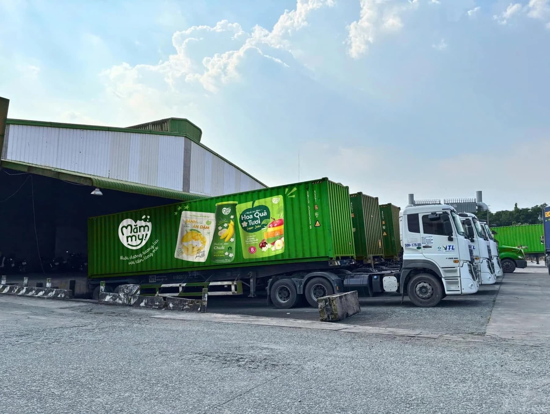 Mămmy-branded export trucks at the distribution facility
